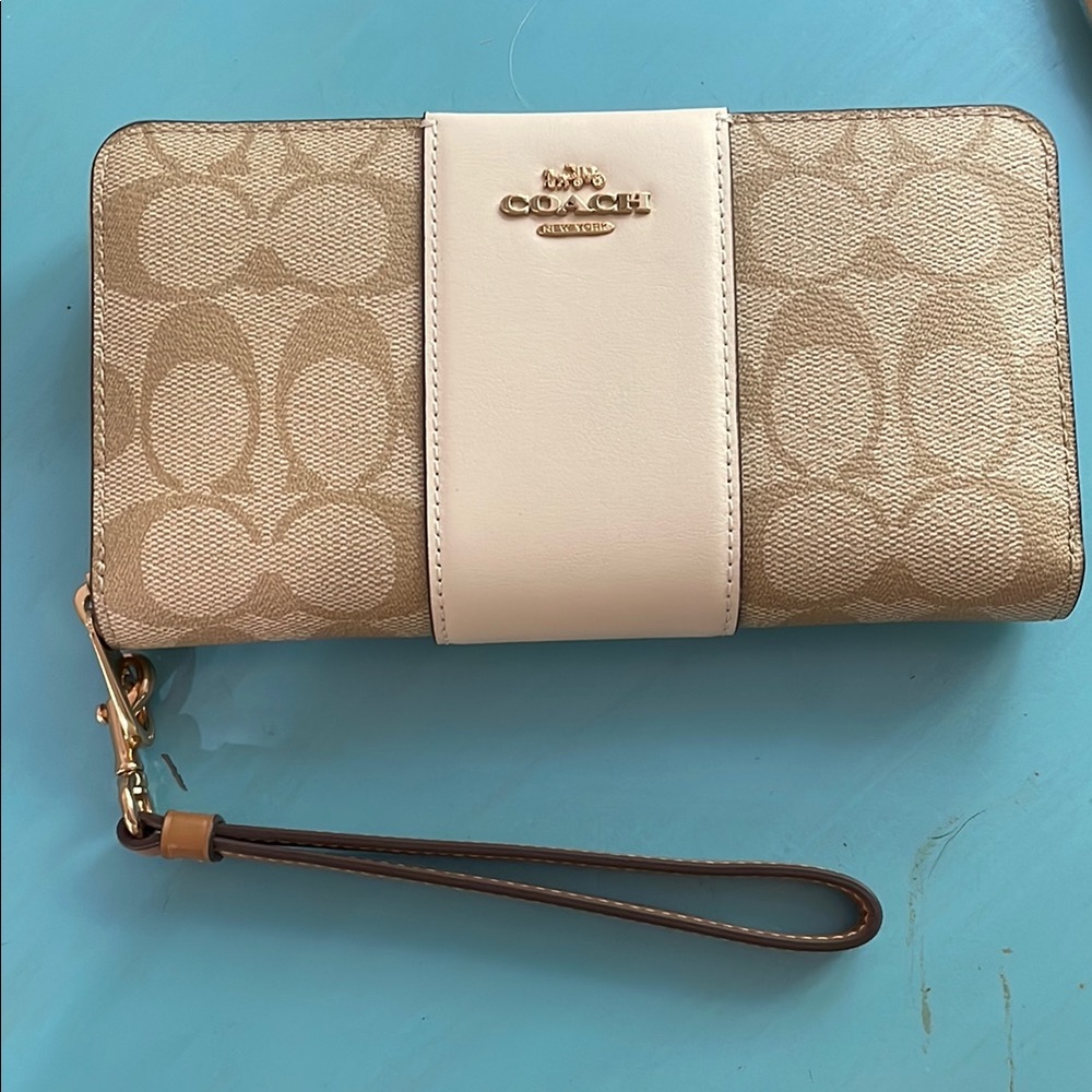 Brand new Coach Beige and White Wristlet Wallet